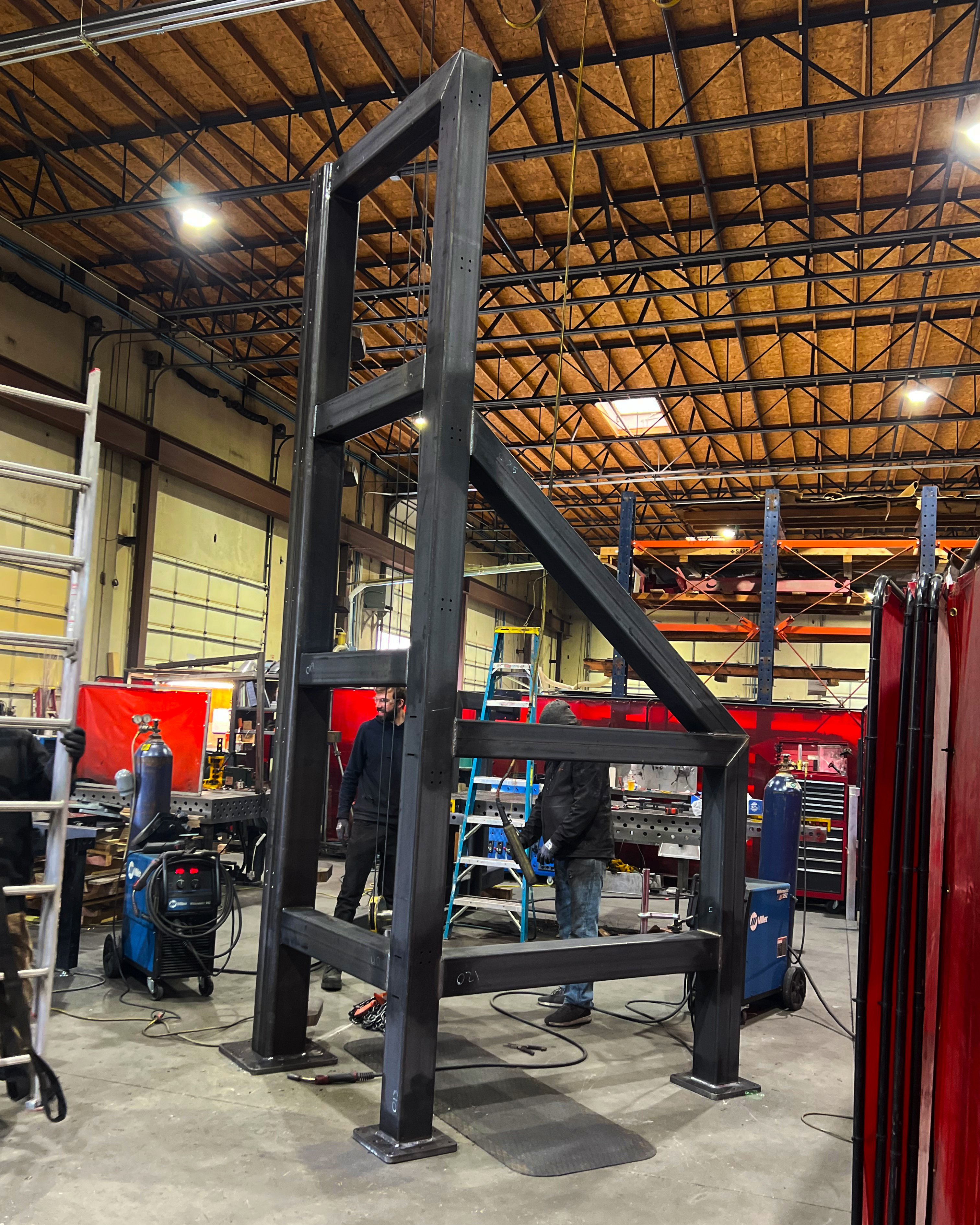 massive steel structure that will be used by a space company. This was created by utilizing our tube laser, machining, and welding capabilities. 